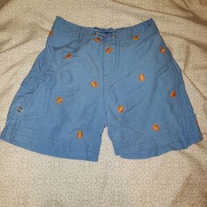 GYMBOREE BLUE SWIM SHORTS WITH ORANGE CRABS 6-12M